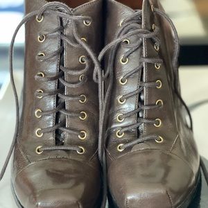 Slightly worn lace up 4 1/2 inch Nine West booties